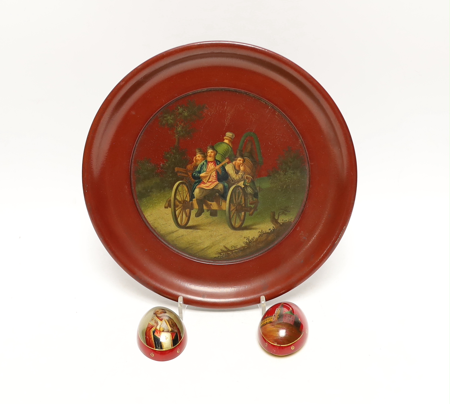 A Russian lacquer dish and a small Russian lacquer Easter egg, Lukutin, late 19th century, 21cm and 5.5cm, Please note this lot attracts an additional import tax of 5% on the hammer price